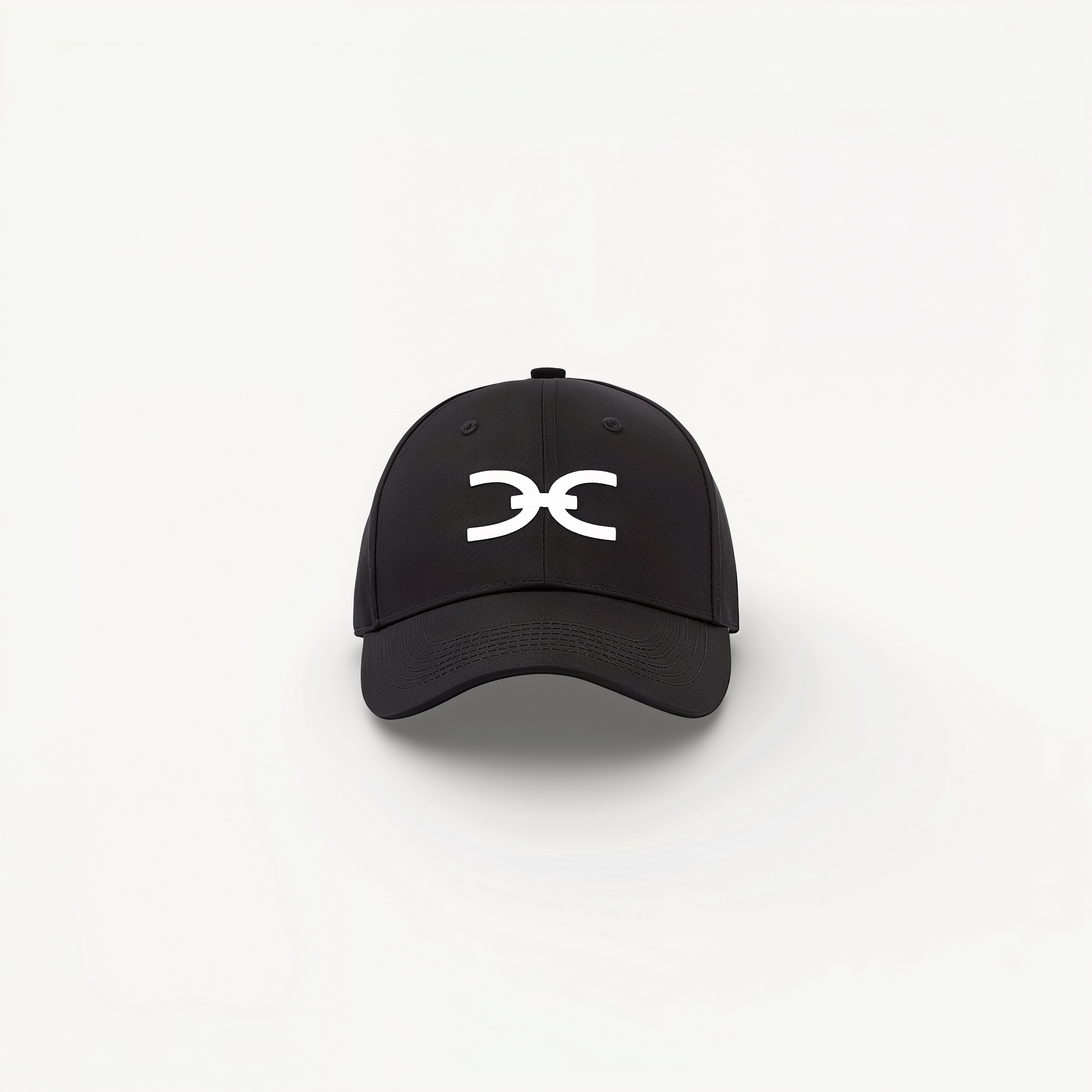 Black cap with ENVOLE logo on a white background.