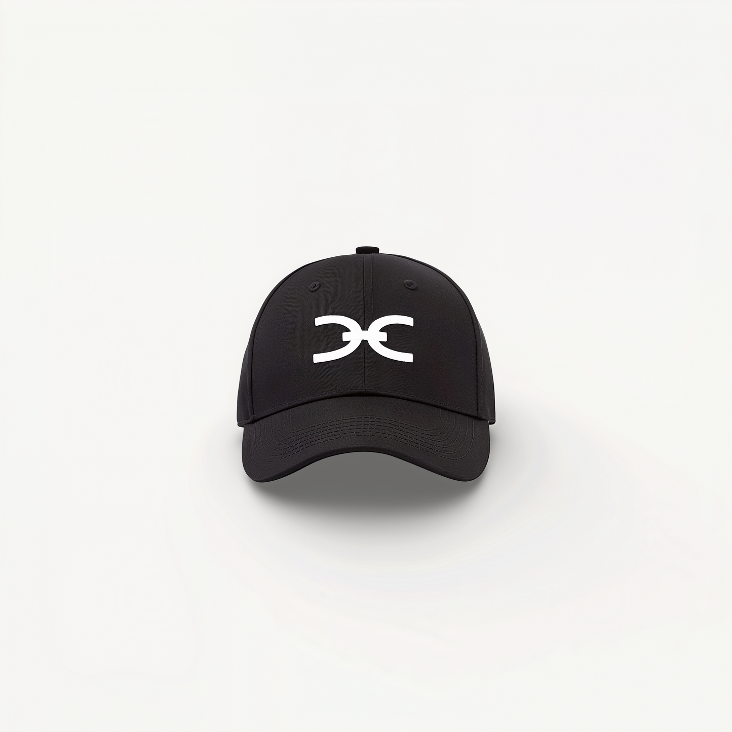 Black cap with ENVOLE logo on a white background.