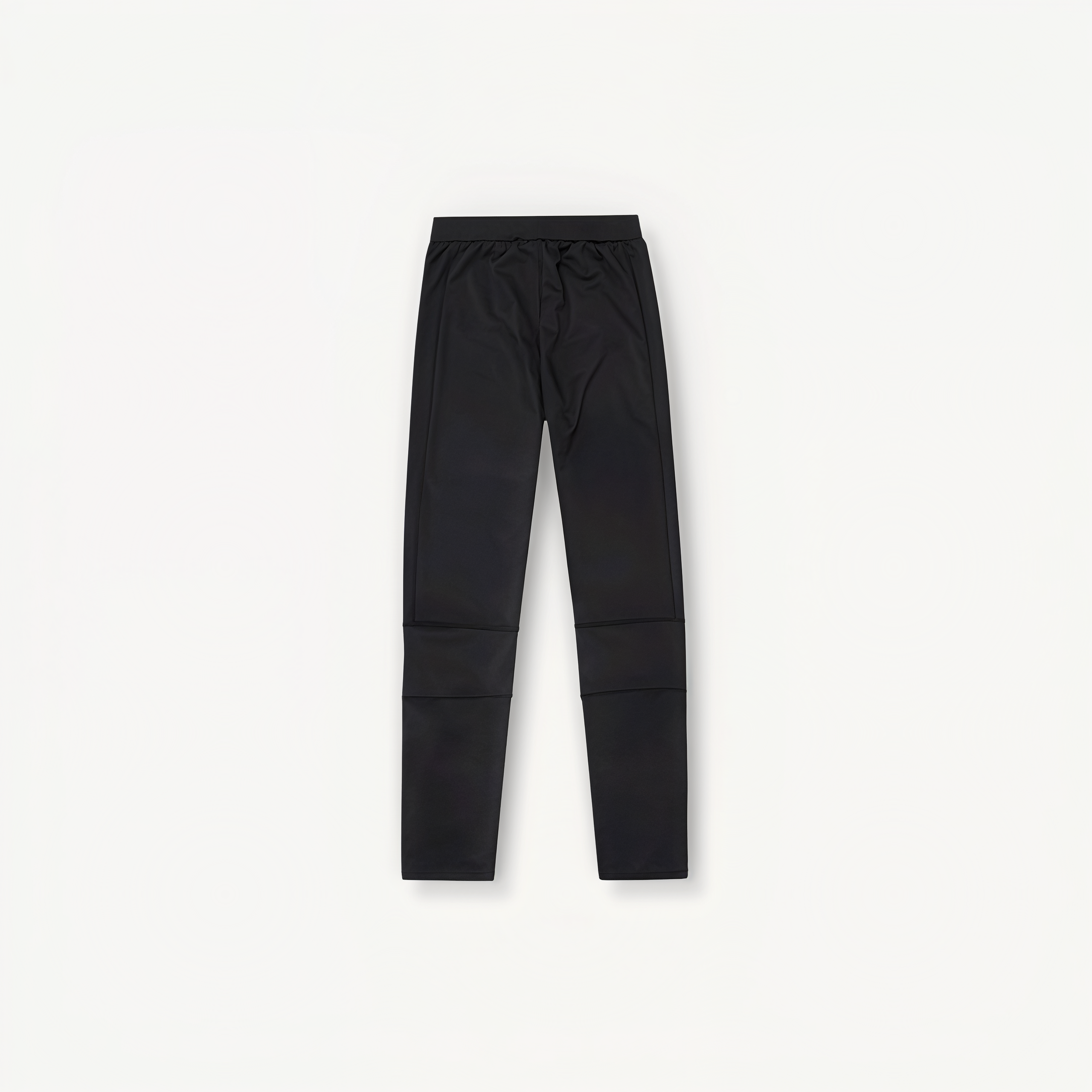 Black athletic leggings with ‘ENVOLE’ logo in front of a white background back view.