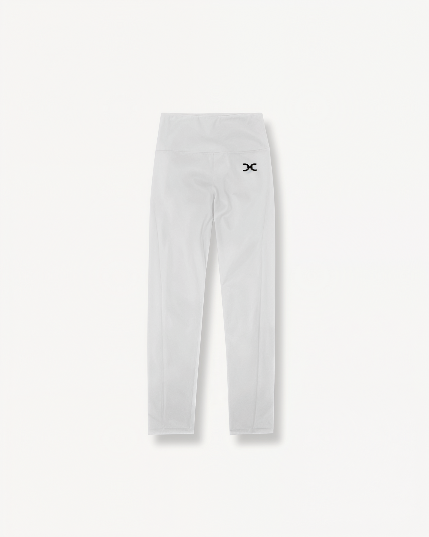 White leggings with a black ENVOLE logo on a light gray background front view.