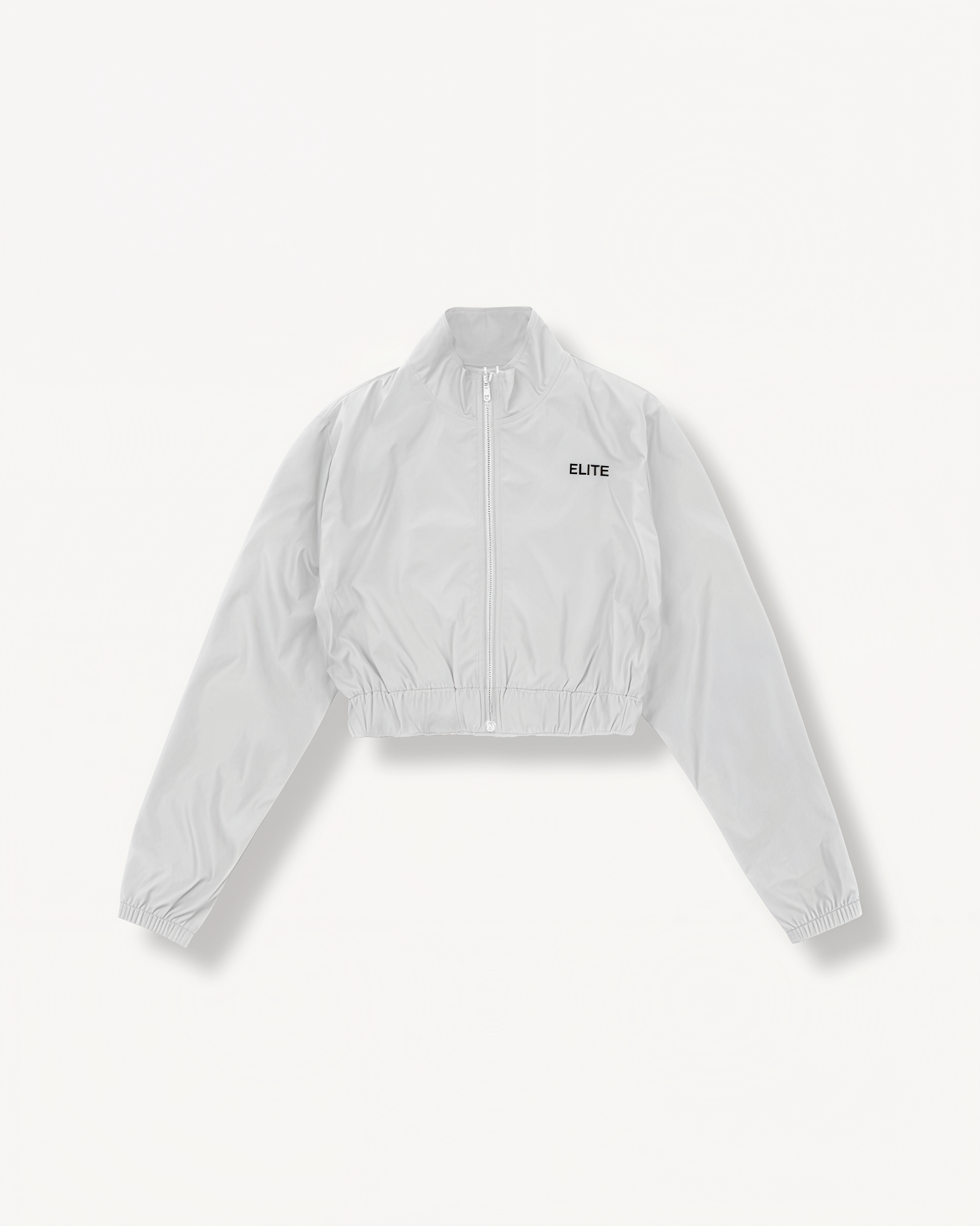 White jacket with 'ELITE' branding on a light gray background front view.