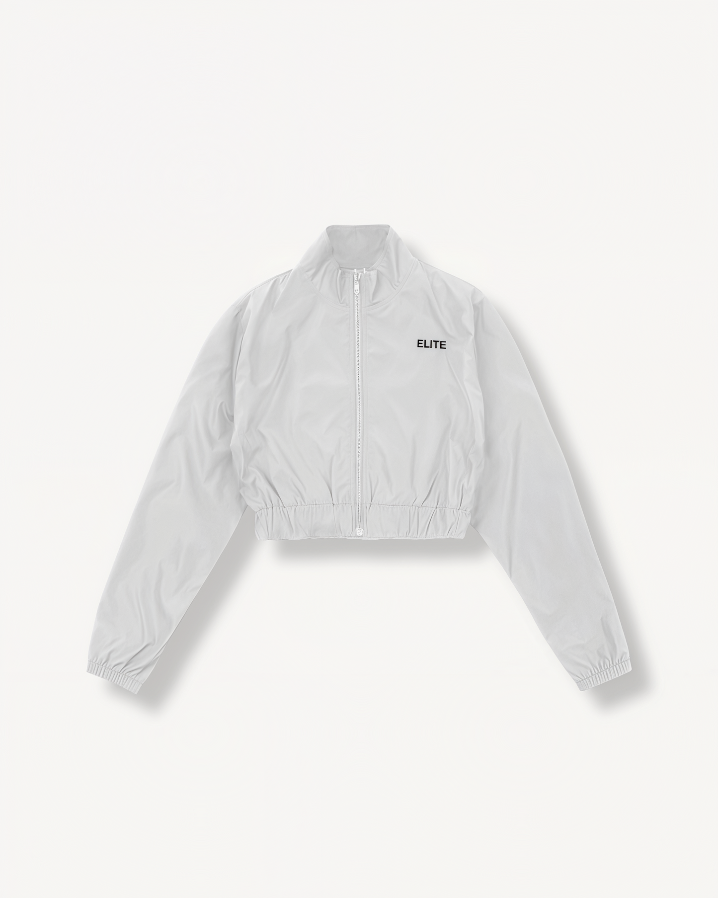 White jacket with 'ELITE' branding on a light gray background front view.