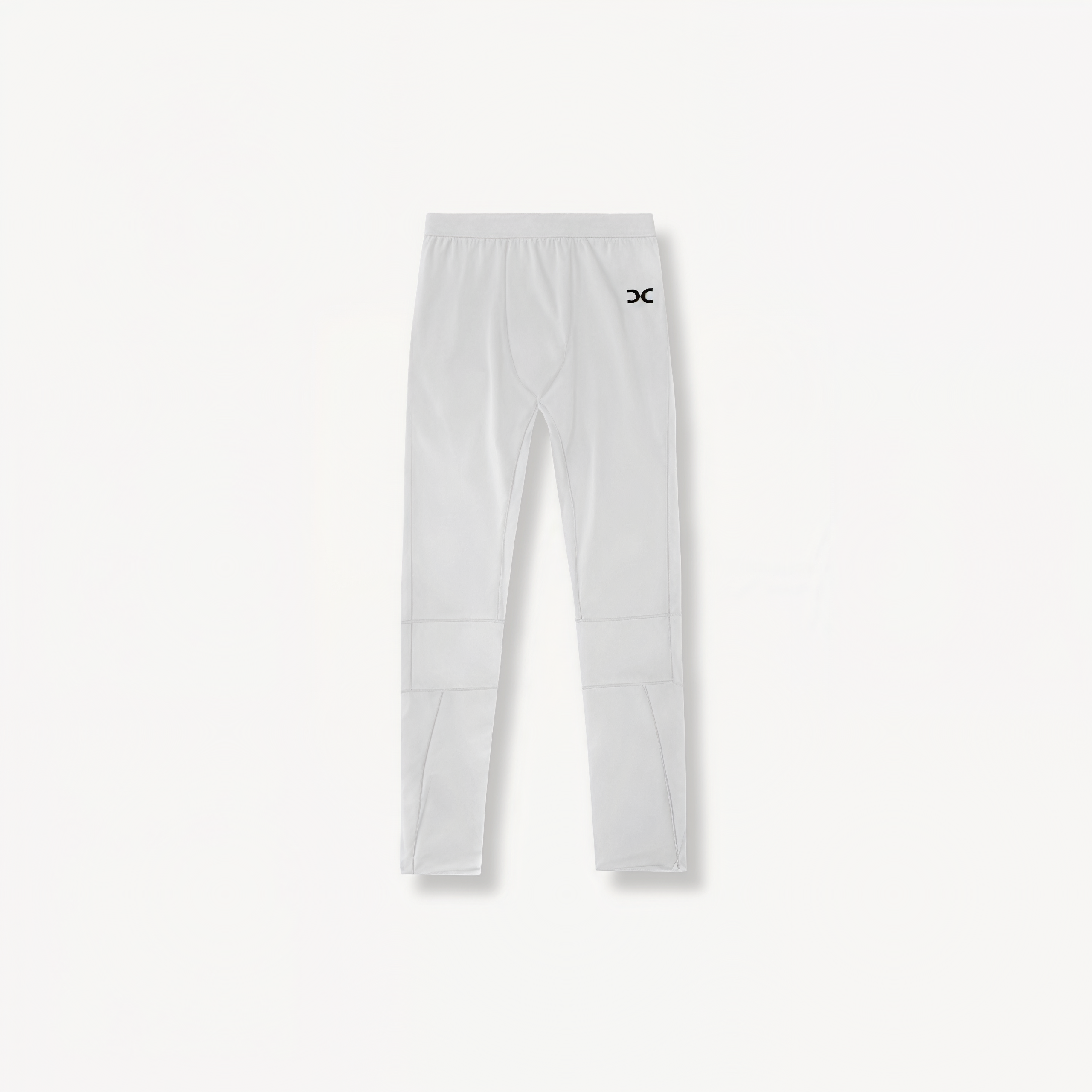 White leggings with ENVOLE logo in front of a light gray background front view.