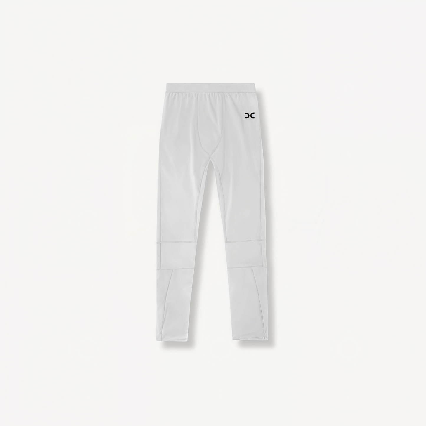 White leggings with ENVOLE logo in front of a light gray background front view.