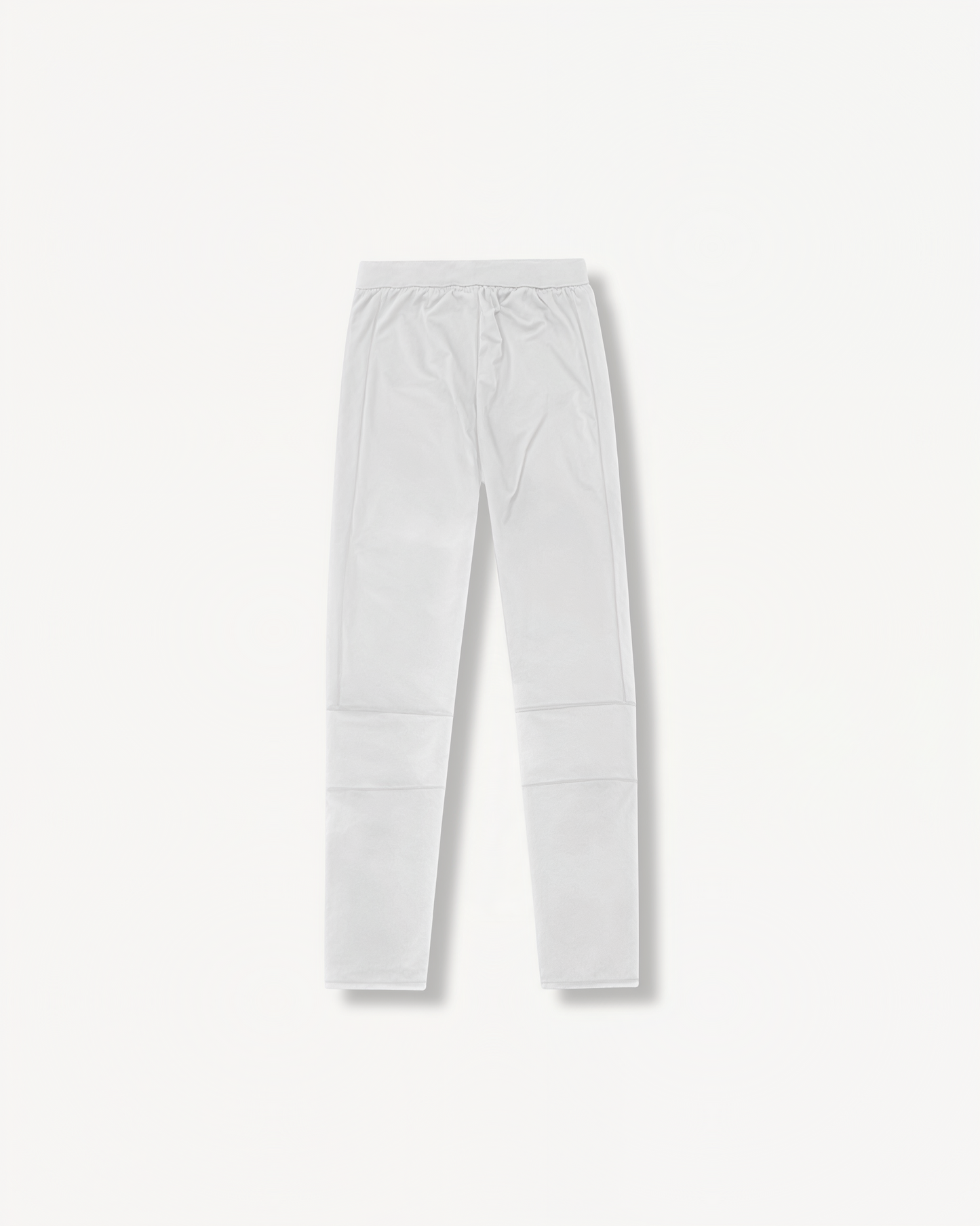 White leggings with ENVOLE logo in front of a light gray background back view.