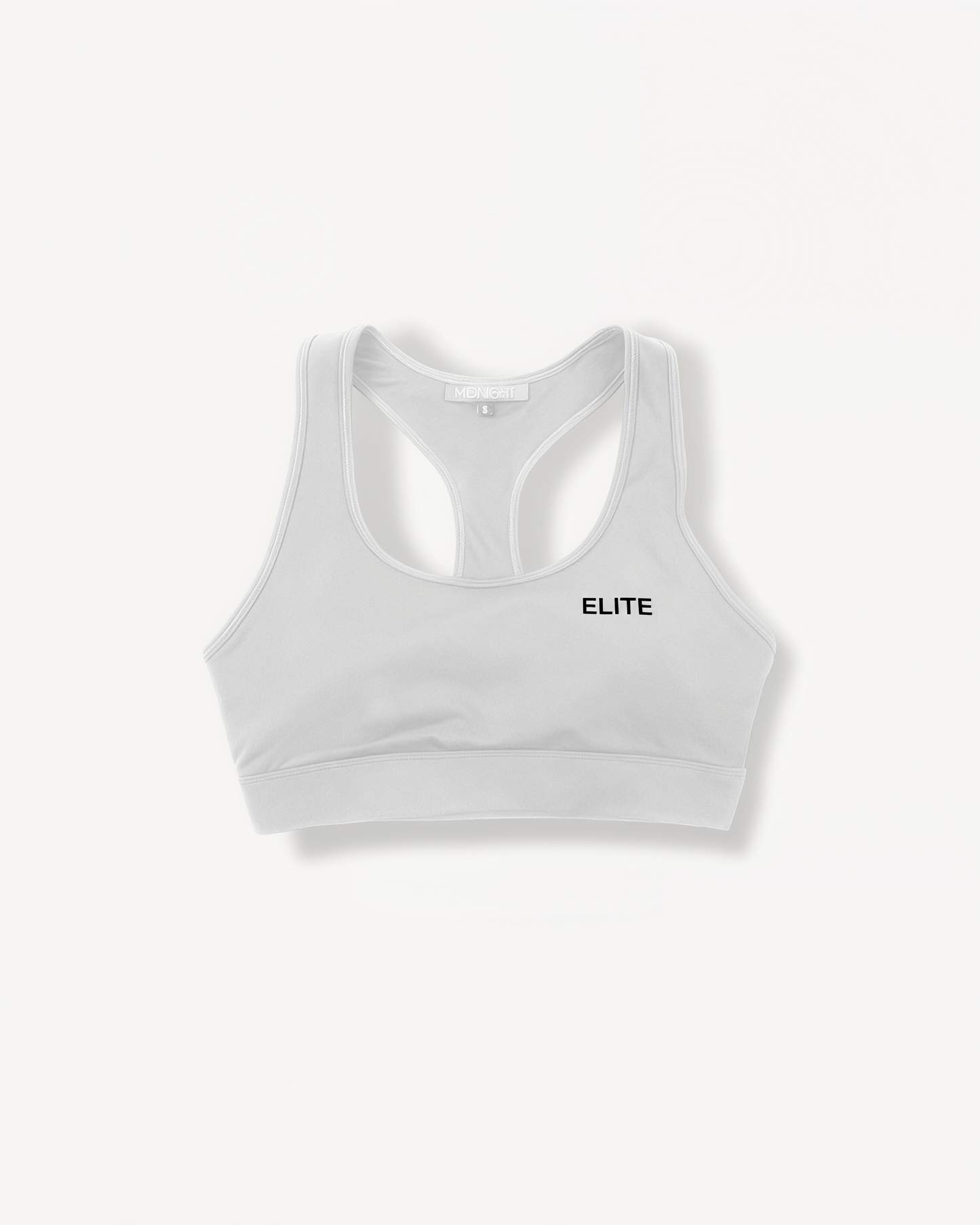 White sports bra with 'ELITE' ENVOLE logo on a white background front view.